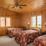 beds inside cabin at hiawatha beach resort